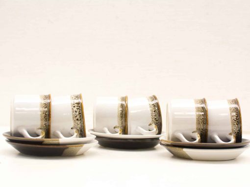 Elegant coffee set with gold accents, featuring six cups and saucers for special occasions.