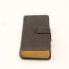 Elegant vintage leather notebook with gilded edges, ideal for journaling and treasured memories.