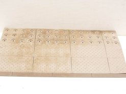 Beige textured tiles for accessible pathways, designed for safety and ease of navigation.