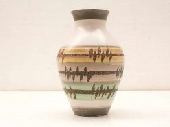 Artistic ceramic vase with striped design and abstract patterns in earthy tones.