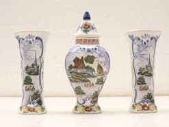 Elegant vintage ceramic vase set with intricate hand-painted rural scenes, perfect for home decor.