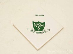 Commemorative NVH 85 Jaar tile from Groningen, featuring emblem and historical significance.