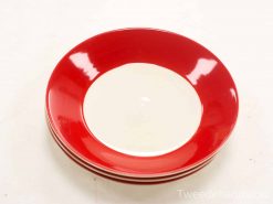 Vintage dinner plates with vibrant red rims, perfect for stylish dining occasions. Set of 4.