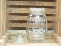 Elegant glass jar with barrel design, perfect for storage or decorative use.