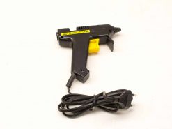 Ergonomic black hot glue gun for precise application in crafts and DIY projects.