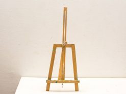 Rustic wooden easel with paint splatters, adjustable height, perfect for artists creative projects.