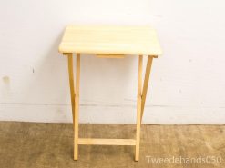 Versatile light wooden folding table, perfect for dining, workspace, or casual gatherings.