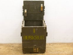 Military wooden crate with BUSKRUT marking, olive green, sturdy design, and secure latches.