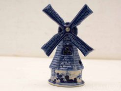 Charming blue and white Delftware miniature windmill, perfect for collectors and home decor.