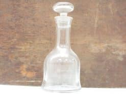 Elegant glass decanter with personalized engraving, perfect for serving wine and spirits.