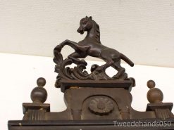 Elegant vintage wooden horse sculpture rearing in dynamic pose, showcasing exquisite craftsmanship and detail.