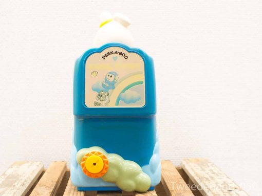 Colorful PEEK-A-BOO toy bottle for kids, featuring playful designs and interactive elements.