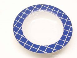 Stylish white plate with a striking blue geometric rim, perfect for any dining occasion.