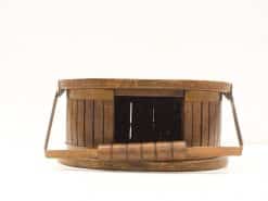 Rustic wooden basket with metal handles, perfect for storage and adding vintage charm to your decor.