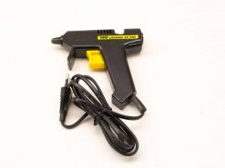 UHU Pistole LT 110: Ergonomic black and yellow glue gun for precise DIY applications.