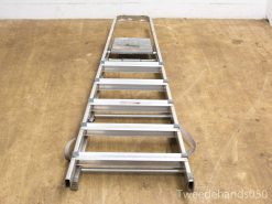 Adjustable aluminum ladder for safe home improvement and maintenance tasks.