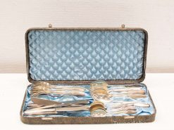 Elegant vintage silverware set in a stylish carrying case, perfect for collectors and fine dining.