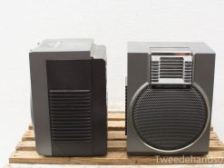 Vintage audio speakers with sleek design and superior sound quality for collectors and decor.