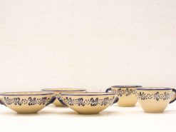 Elegant vintage terracotta bowl and cup set with intricate blue patterns, perfect for cozy gatherings.