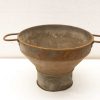 Vintage metal funnel with handles, featuring a charming patina and perfect for precise pouring.