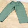 Comfortable green outdoor pants with elastic waistband; perfect for hiking and casual activities.