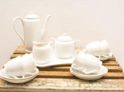 Elegant 16-piece vintage porcelain tea set for a refined afternoon tea experience.