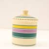 Colorful hand-painted ceramic container with lid, perfect for storage and home decor.