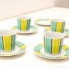 Vibrant striped cup and saucer set for stylish coffee and tea occasions.