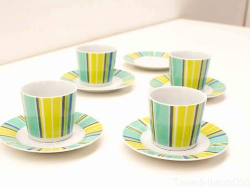 Vibrant striped cup and saucer set for stylish coffee and tea occasions.