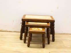 Elegant wooden nesting tables set, perfect for stylish and functional living space decoration.