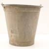 Rustic vintage metal bucket with handles, perfect for gardening or decorative use.