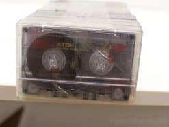 Vintage TDK cassette tape showcasing nostalgia and music history, perfect for collectors and retro enthusiasts.