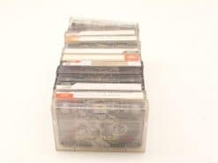 Vintage TDK cassette tapes collection with unique labels and nostalgic charm for music lovers.