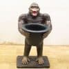 Vintage gorilla garden statue with planter pot, perfect for adding charm to your outdoor space.