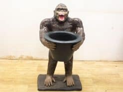 Vintage gorilla garden statue with planter pot, perfect for adding charm to your outdoor space.