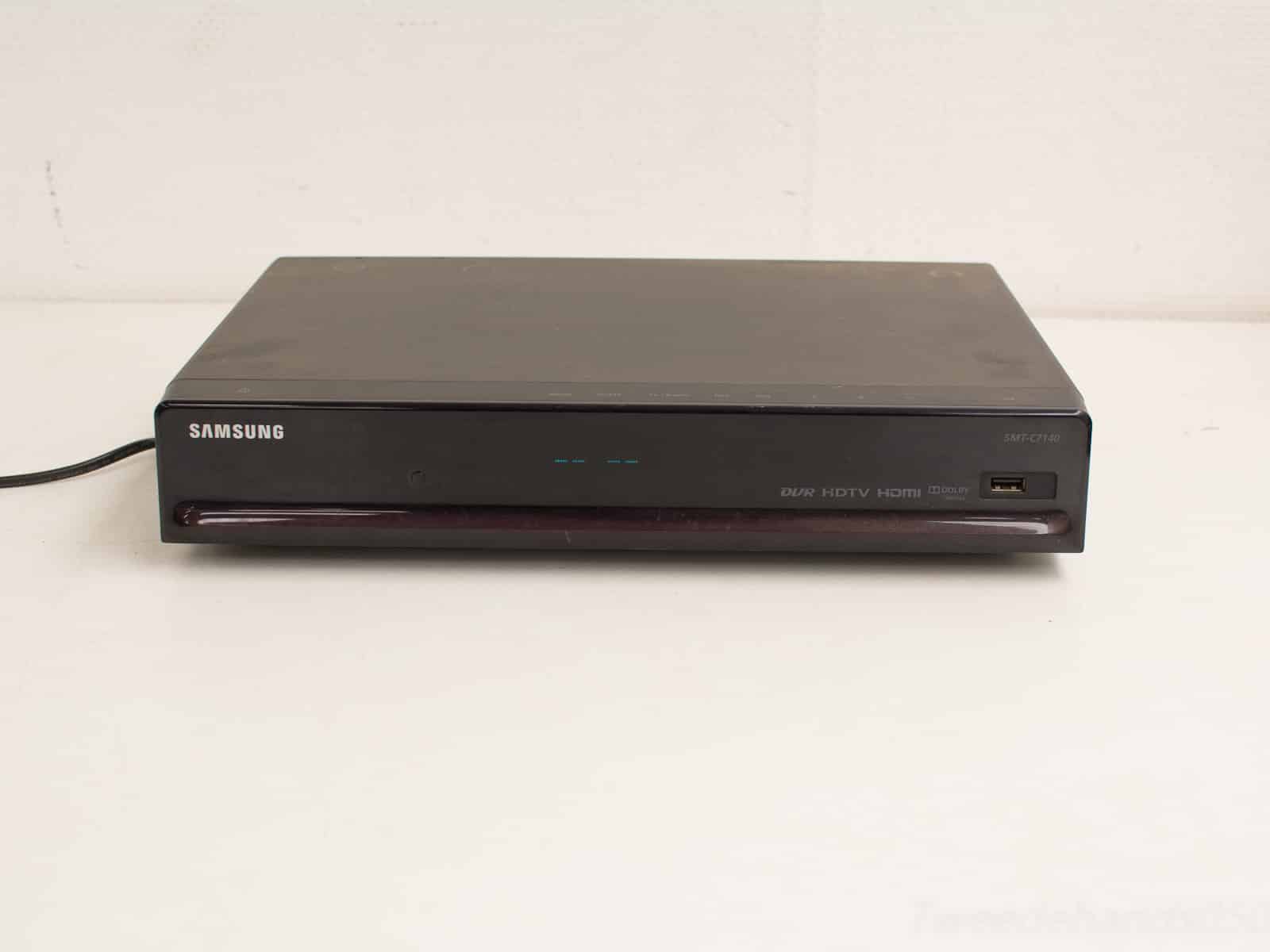 Sleek black Samsung DVR: modern media player with HDMI for high-definition home entertainment.