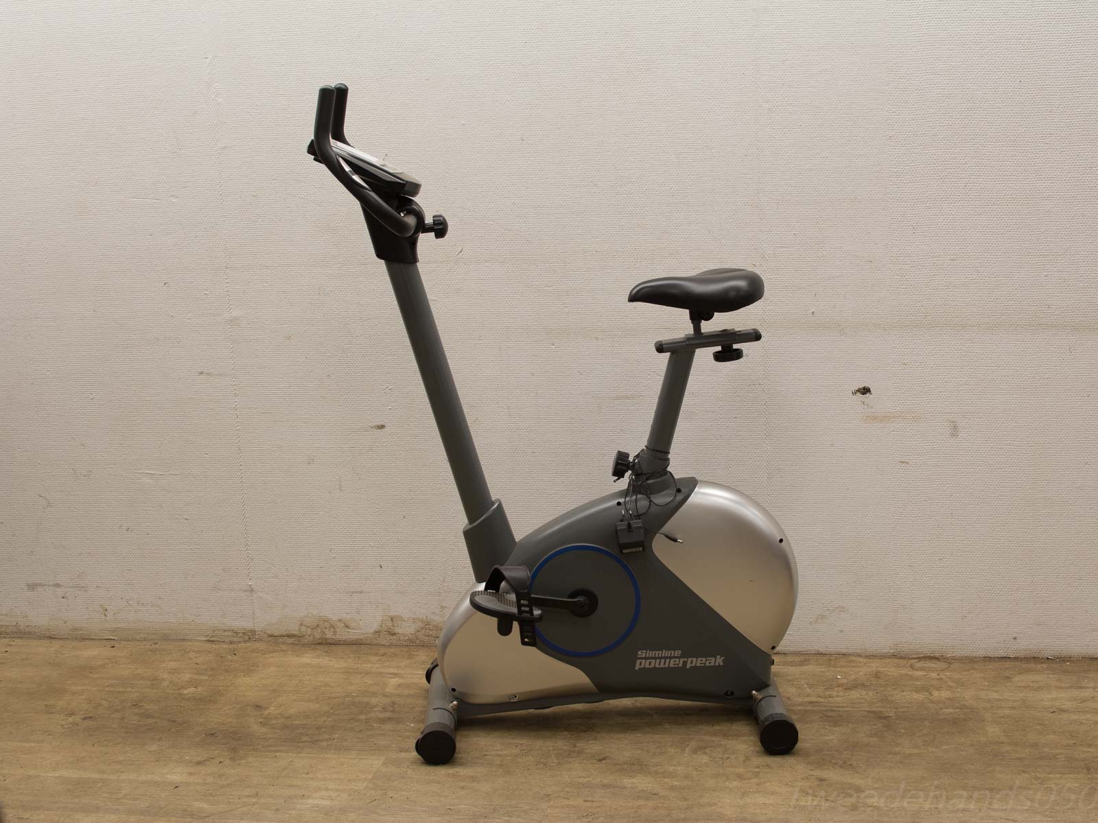 Sleek Slimline Power Peak stationary exercise bike, perfect for home workouts and fitness enthusiasts.