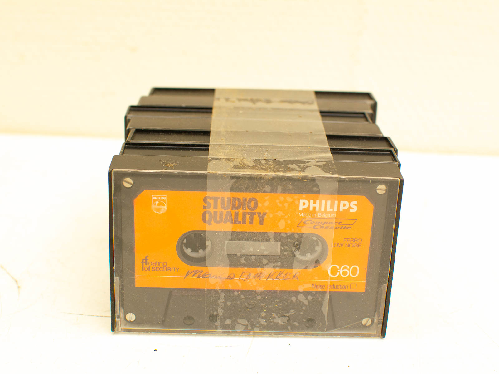 Vintage Philips C60 cassette tape in orange and black, ideal for collectors and audio lovers.