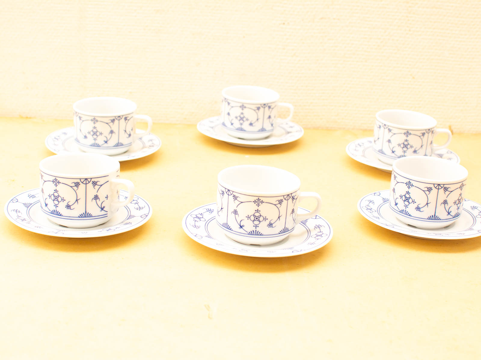 Elegant porcelain tea cups with blue floral patterns for special occasions and delightful gatherings.