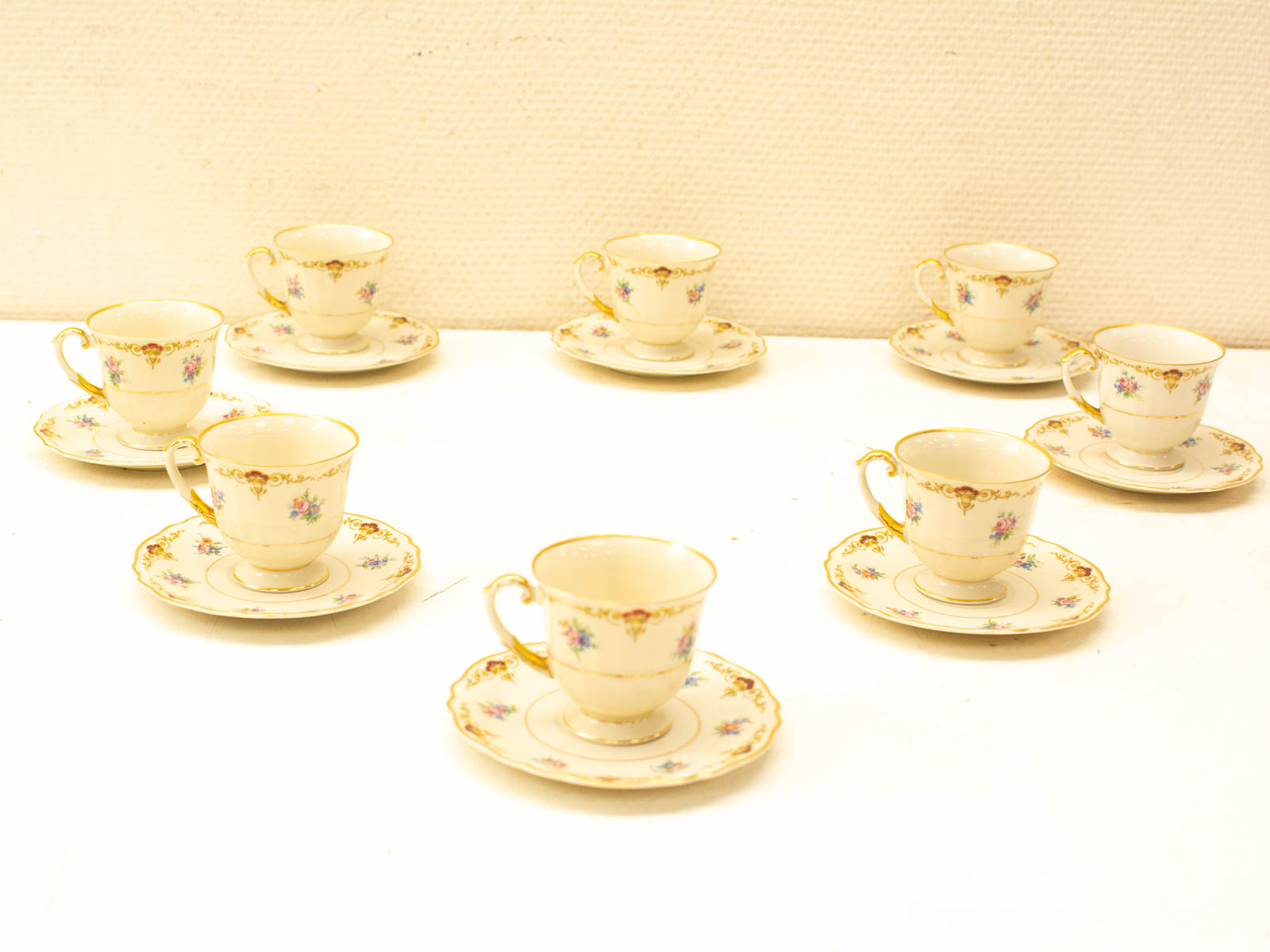 Elegant vintage porcelain tea set with floral patterns, perfect for tea parties and gatherings.