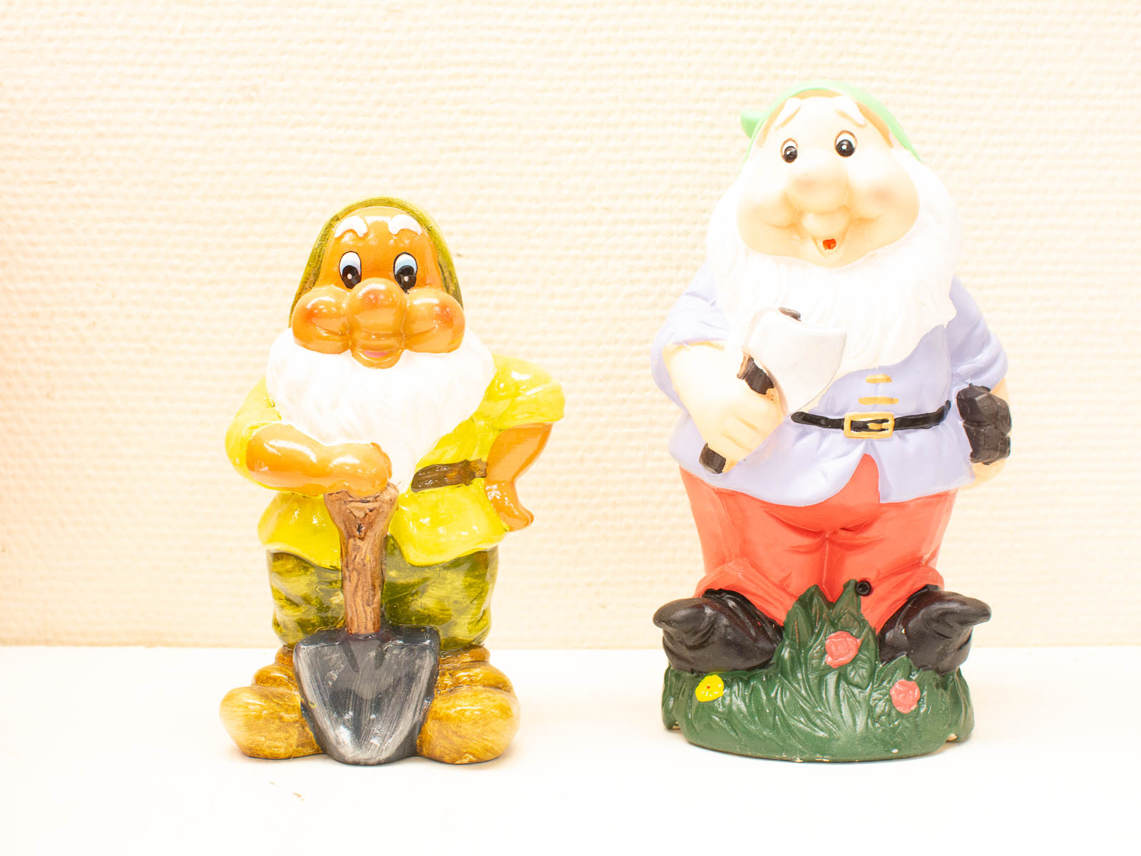 Colorful garden gnome figurines bring whimsical charm and joy to outdoor spaces.