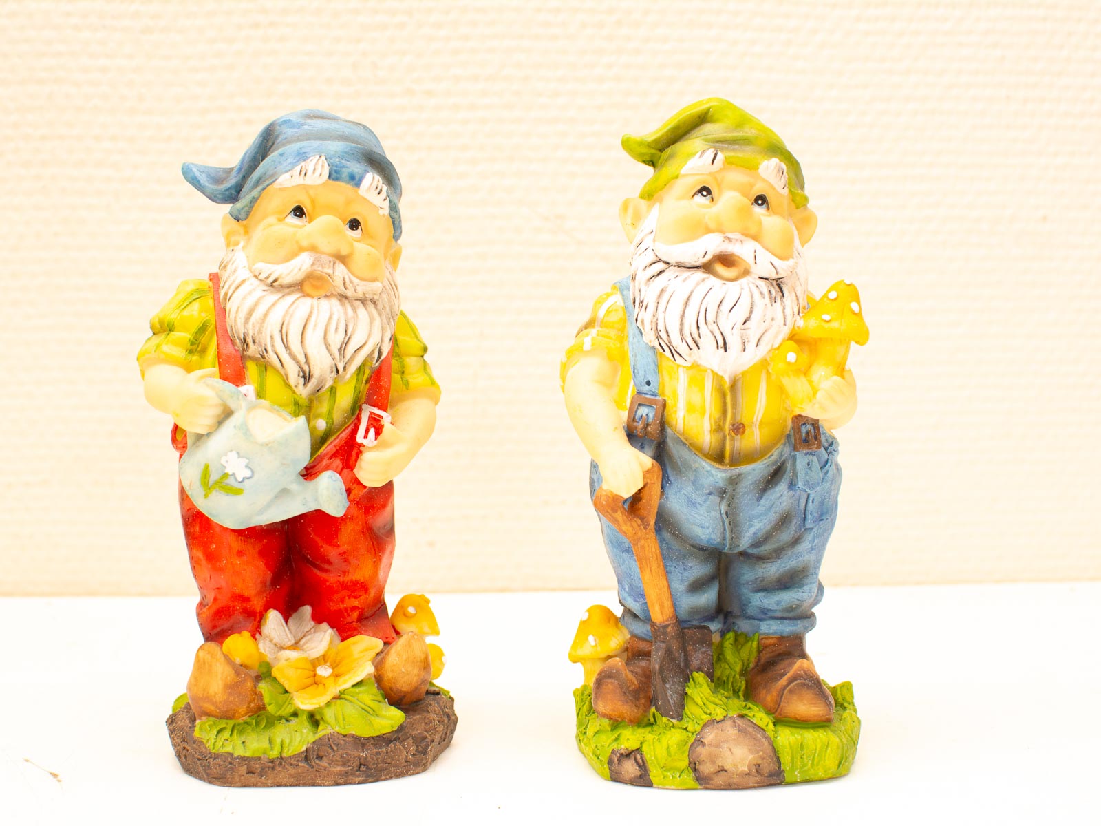 Whimsical vintage garden gnomes with unique styles, perfect for brightening your home or garden.