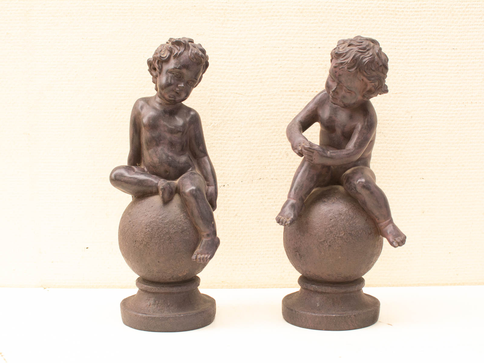 Charming bronze sculptures of playful children, embodying childhood innocence and timeless artistry.