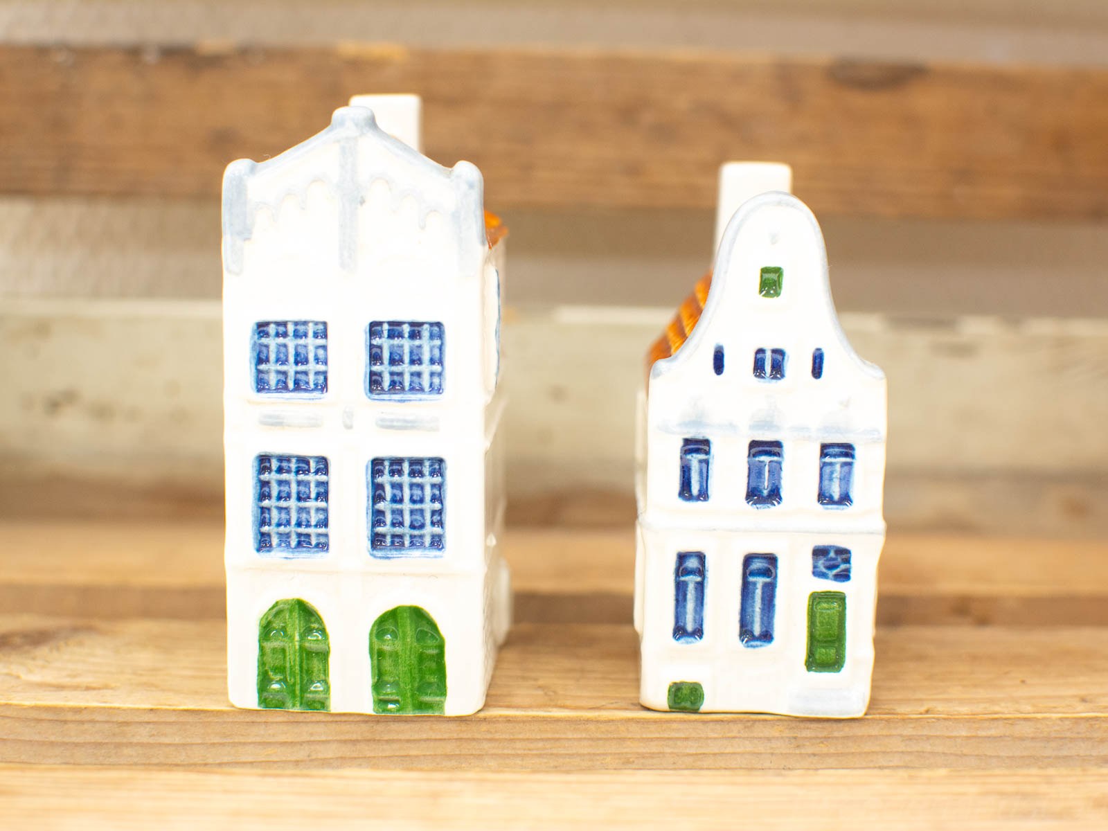 Charming miniature ceramic houses with vibrant colors, perfect for vintage decor and whimsical accents.