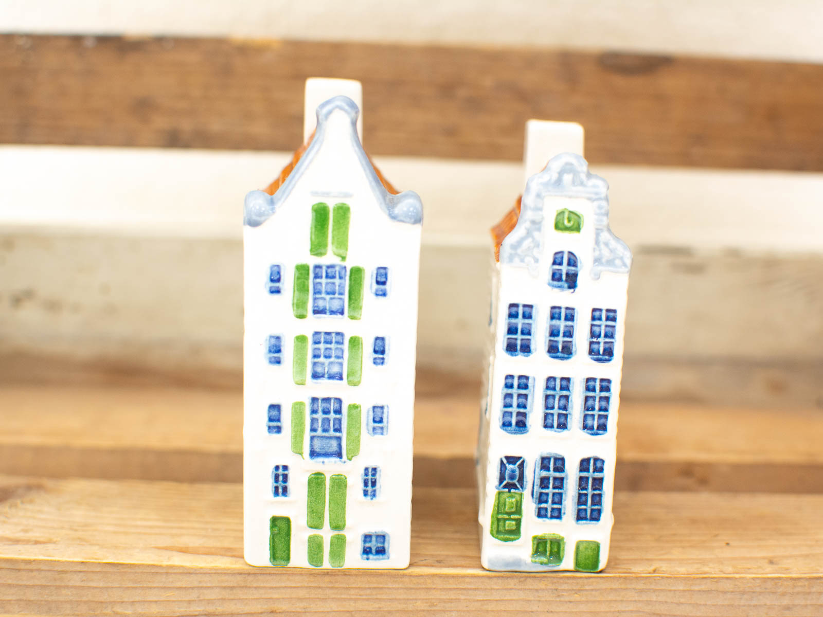 Charming vintage Dutch ceramic house figurines, adding European elegance and nostalgia to your decor.