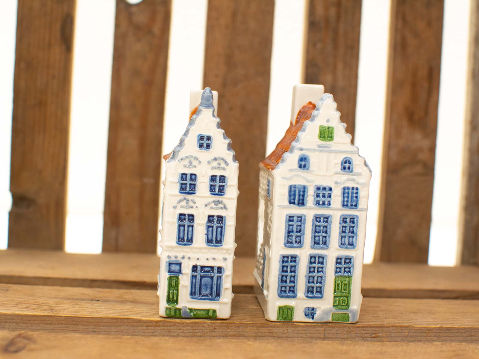 Charming miniature ceramic houses with vibrant colors, perfect for decor and collectors.