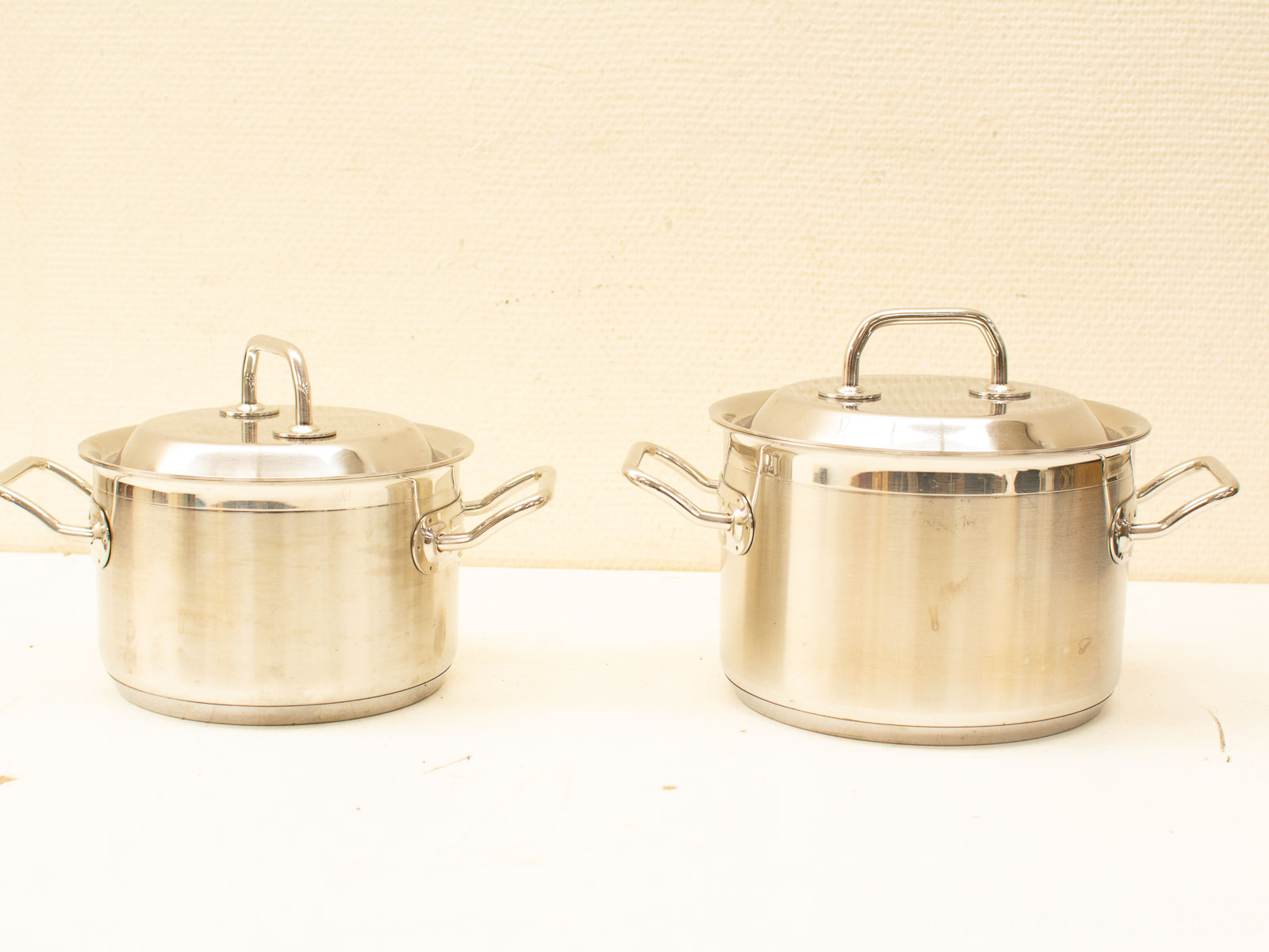 Elegant vintage stainless steel cookware set with polished finish and durable design.