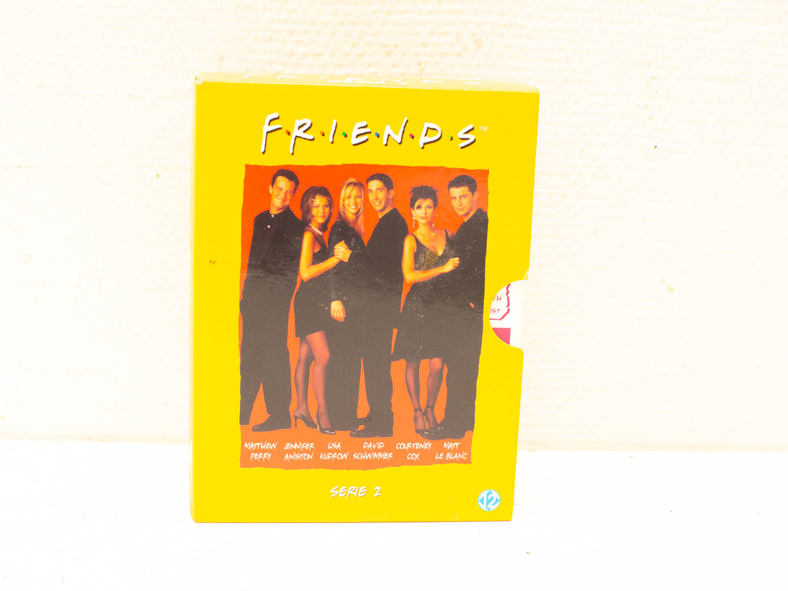 VHS cover of Friends Season 2 featuring the iconic cast in vibrant 90s style.