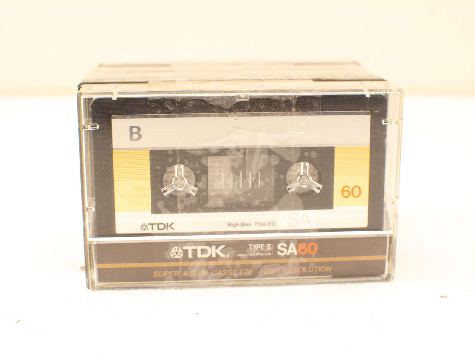 Vintage TDK SA60 audio cassette, high-quality analog sound, 60 minutes of nostalgic playback.