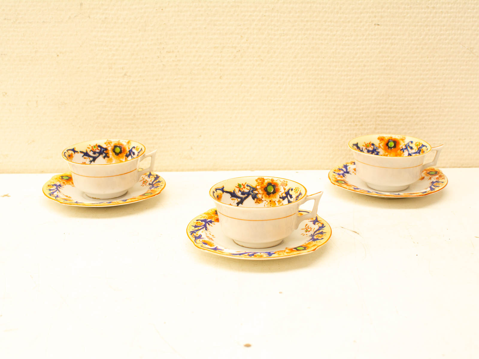 Charming vintage tea cups with floral designs, perfect for cozy tea moments and collectors.